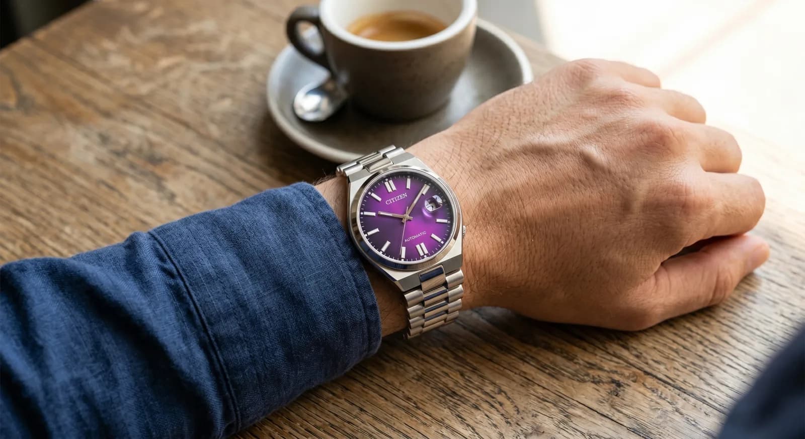 Citizen Tsuyosa NJ0200-50W next to coffee, leaning into the colorful everyday-watch role that makes the piece appealing